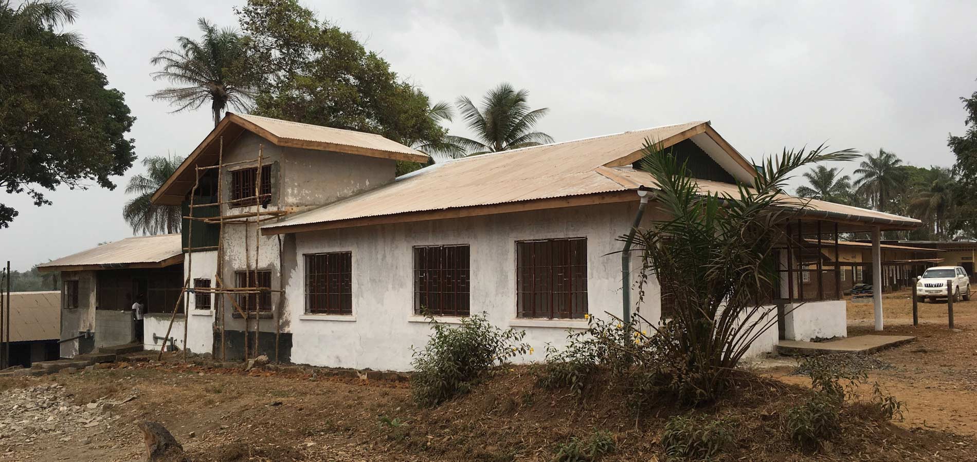 An existing structure, The International House, shown being refurbished to serve as staff housing for staff midwives and their families.